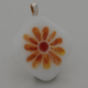 A Wee Brightness Orange Daisy On White